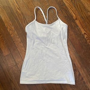 Lululemon classic white fit size 6 with built in bra! Great condition